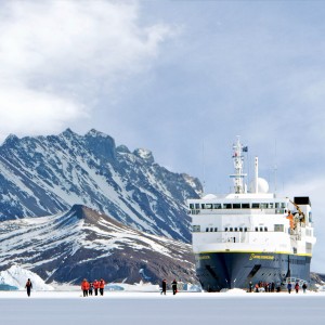 Image of ship in Antarctica promoting the travel program 