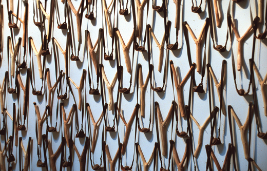 'What My Father Gave Me: A Good Shot,' 2001, Forked sticks, innertube, shoe leather, fired clay