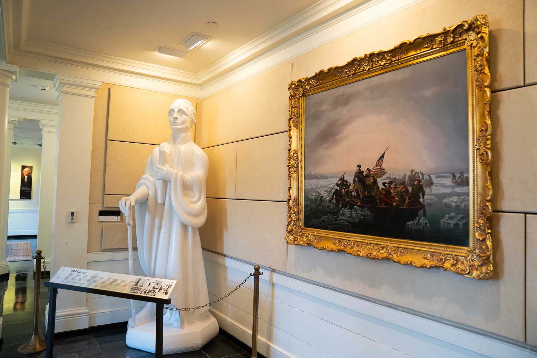 Washington Galleries north wall with Old George statue and a painting