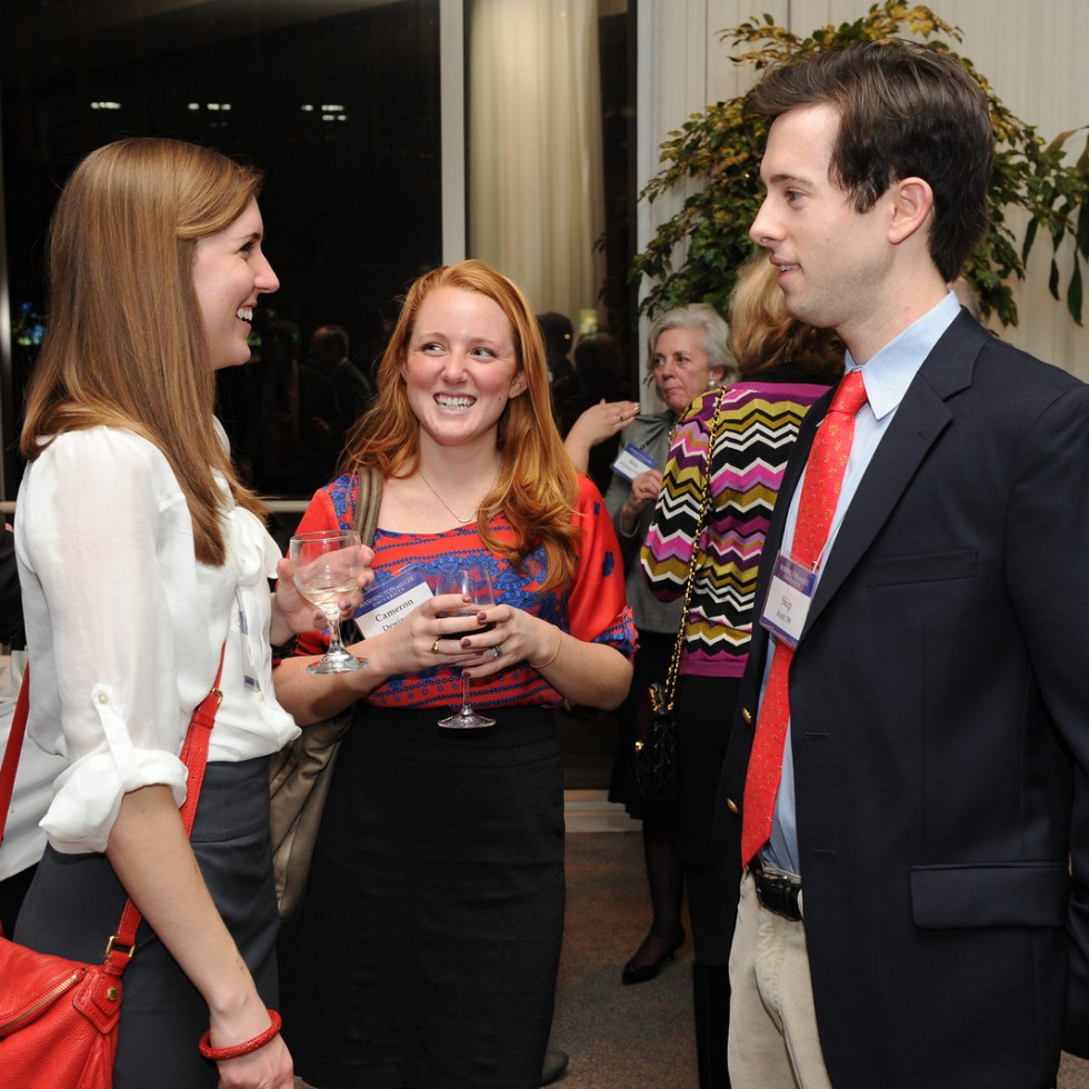 Image of alumni chatting at a Chapter Event