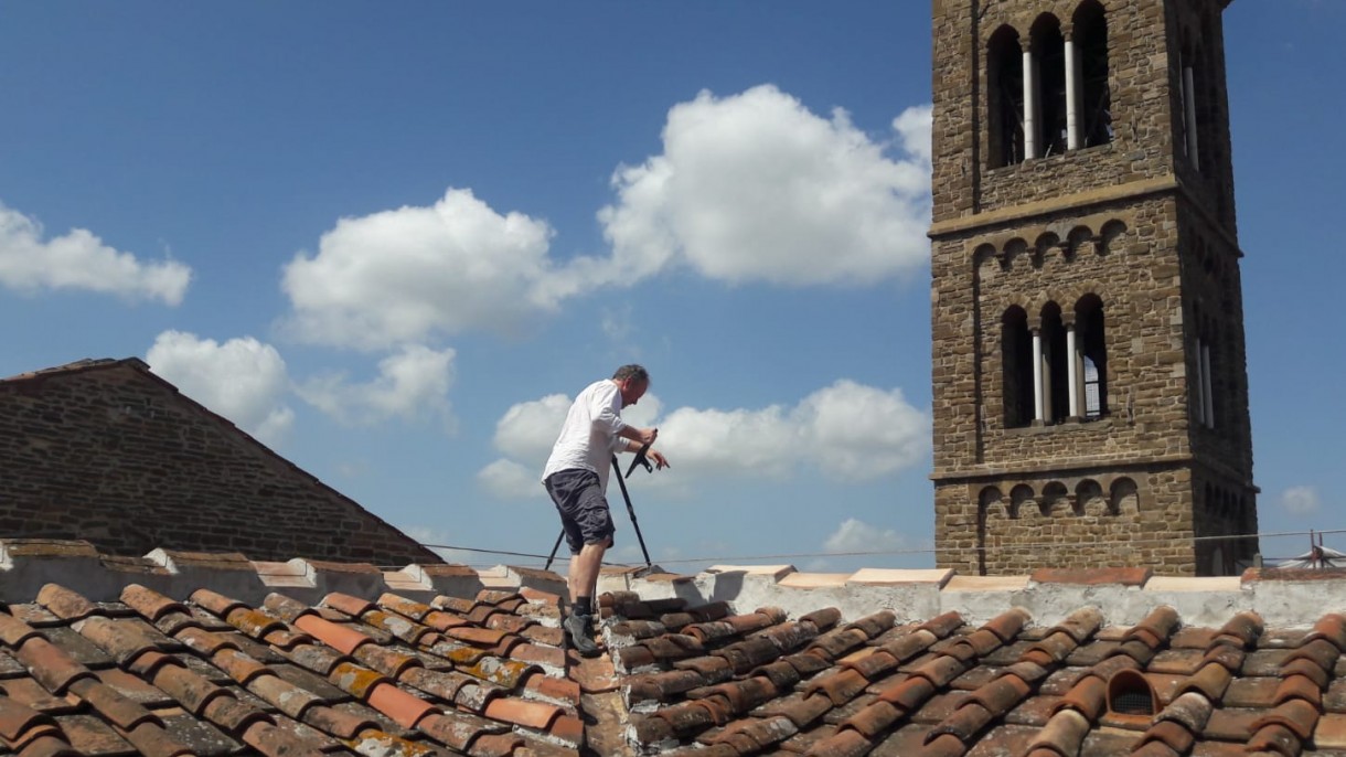 Image of George Bent on a roof in Italy