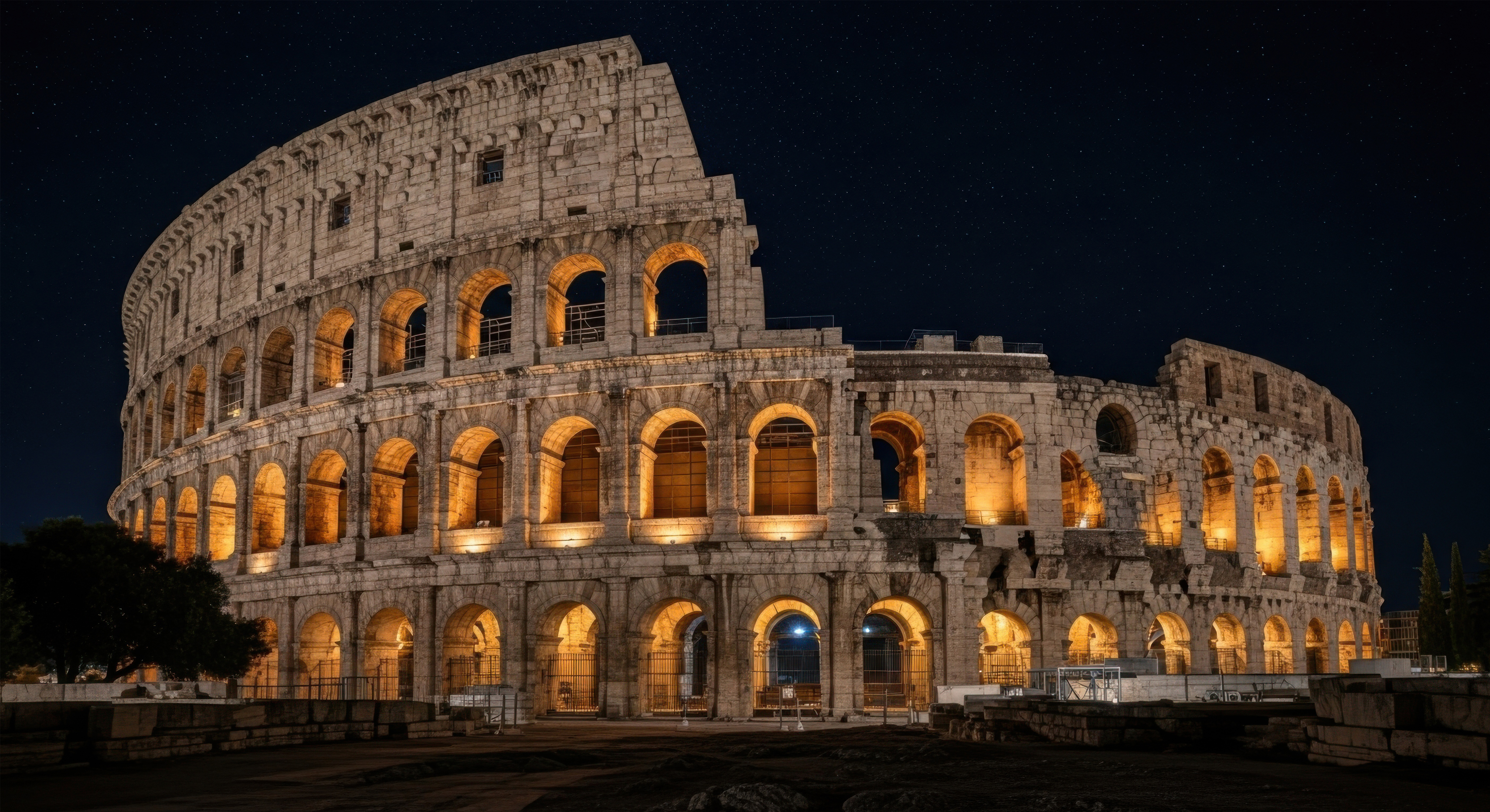 Photo Credit: MEOWZILLA-stock.adobe.com / Colosseum at night