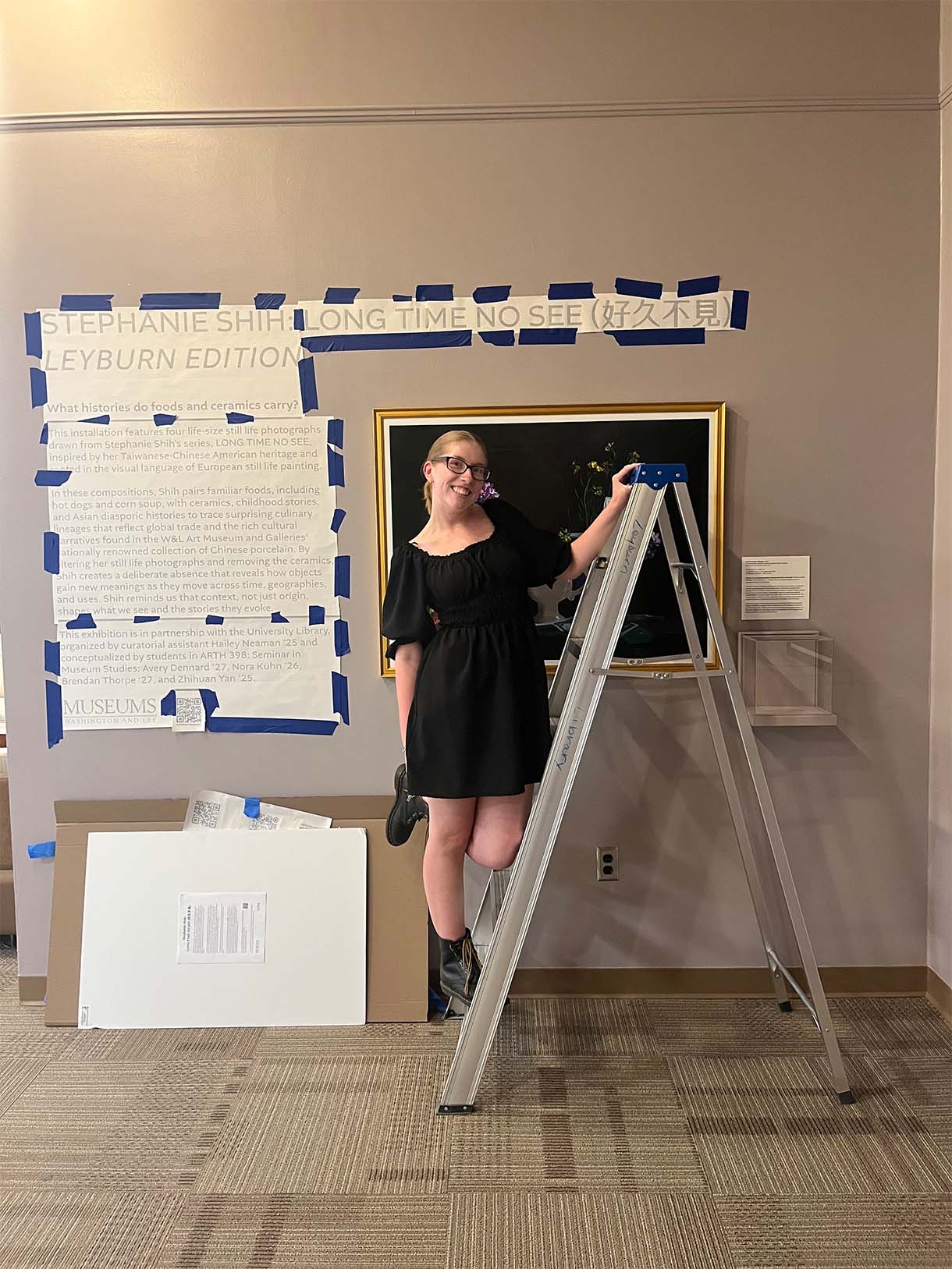 Hailey Neaman working on an installation