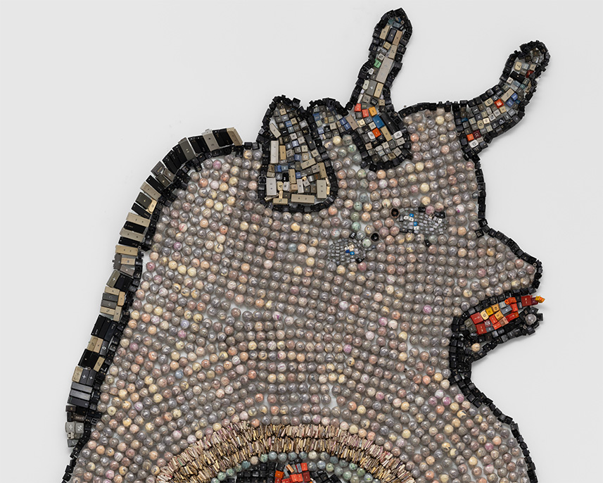 Pregnant Picasso Bull (detail), 2024, Moffat Takadiwa. Zimbabwean bank notes encased in bottle caps, calculator, and computer keys. 107 1/8 x 50 x 2 3/8 in. Image courtesy of Nicodim Gallery. 