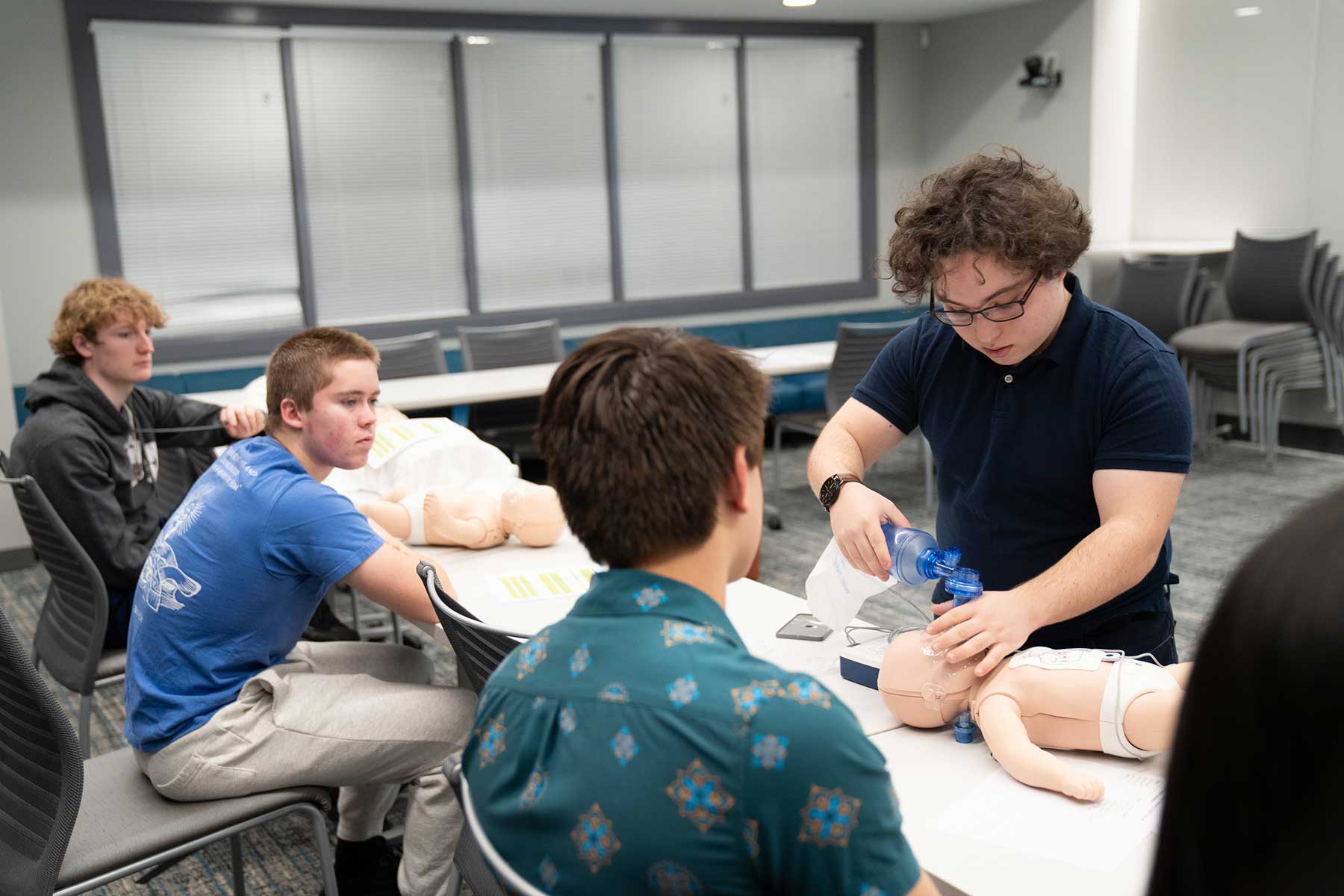 Student teaches a CPR class