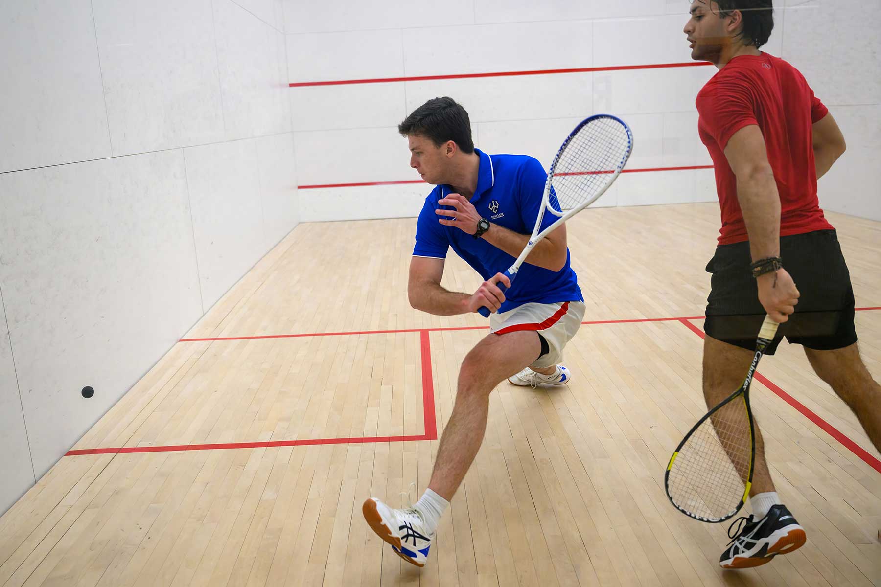students play club squash