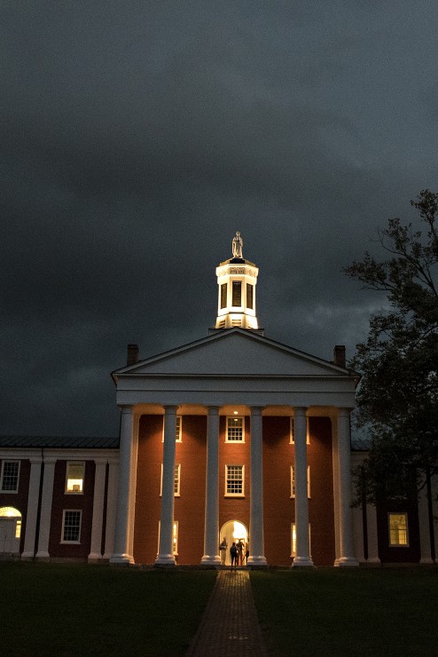 Photo of Washington Hall lit up at night
