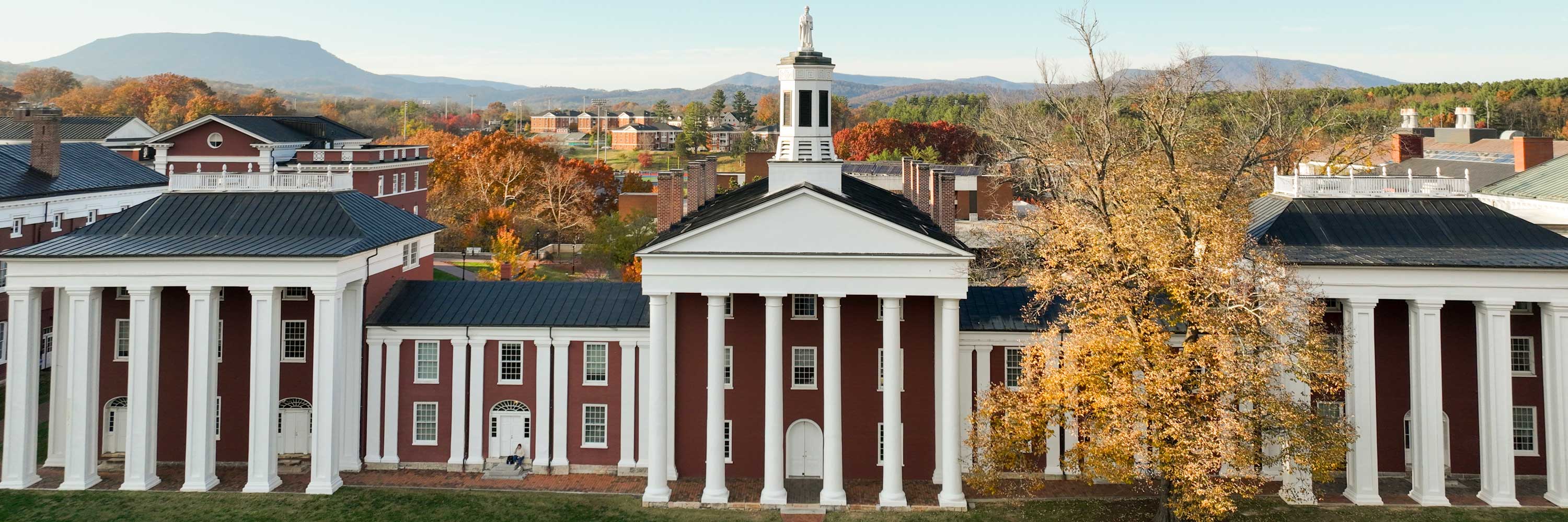 Washington Hall and mountains