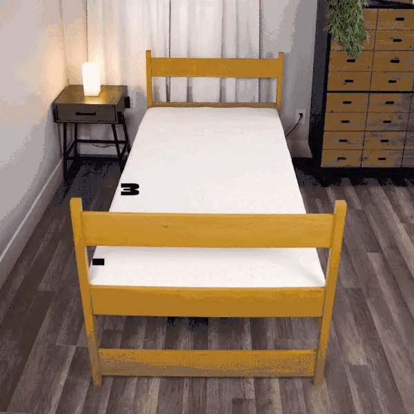 Gif that shows dorm bed is 34 inches without the Bigger Bed mattress and 54 inches with it