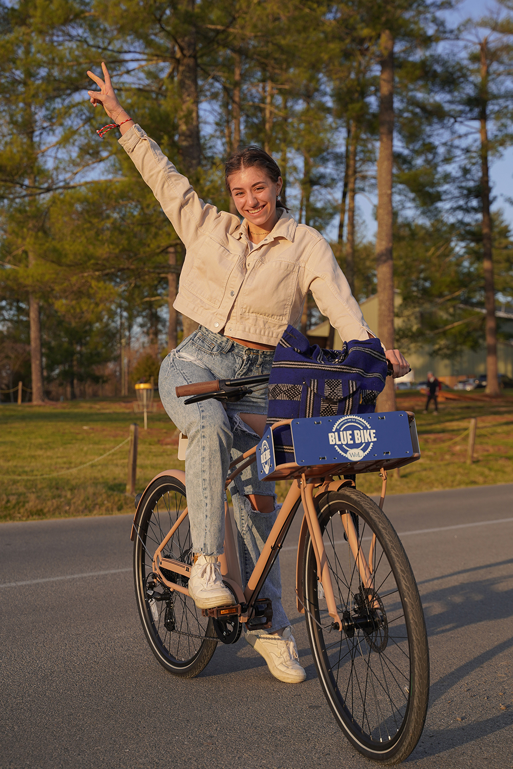Student on a Blue Bike