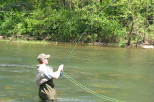 A student fly fishing