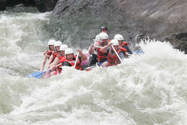 Students whitewater rafting