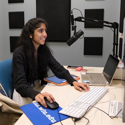 Student working in a Harte Center recording room