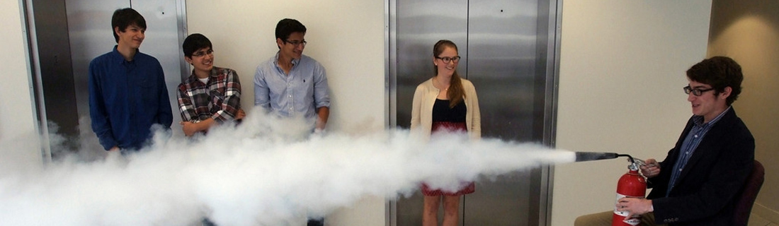 Students with a fire extinguisher