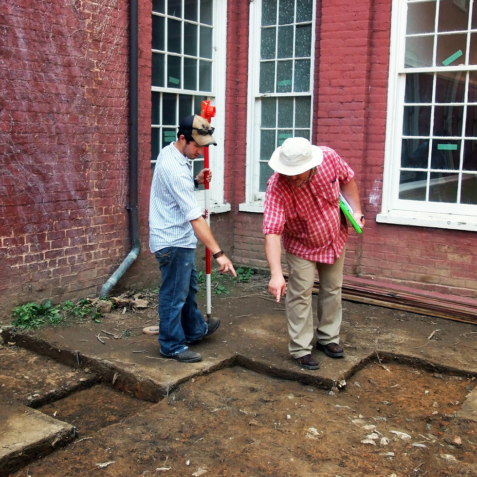 Student and instructor at a dig site