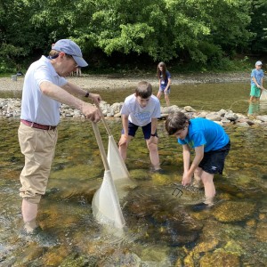 Photo of participants in the river during Family Adventure in Science Outdoors program