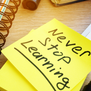 Image of a post-it note with Never Stop Learning
