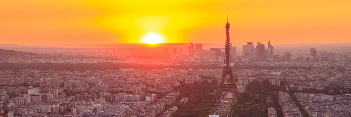 Photo of the Eiffel Tower and Paris sunset. 