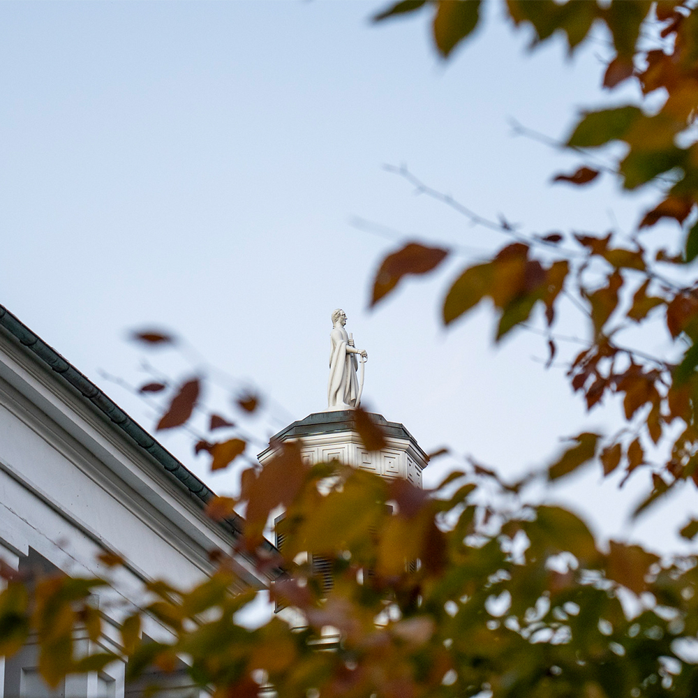 George Washington statue on the top of Washington Hall 