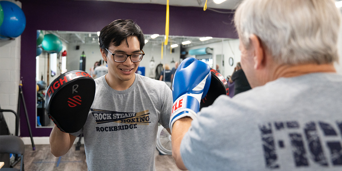 Tharun Svetanant '27 serves as an Assistant Coach at Rockbridge Rock Steady Boxing