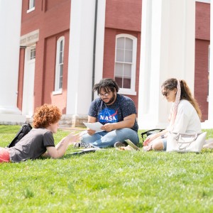Image of students chatting in front of the Colonnade