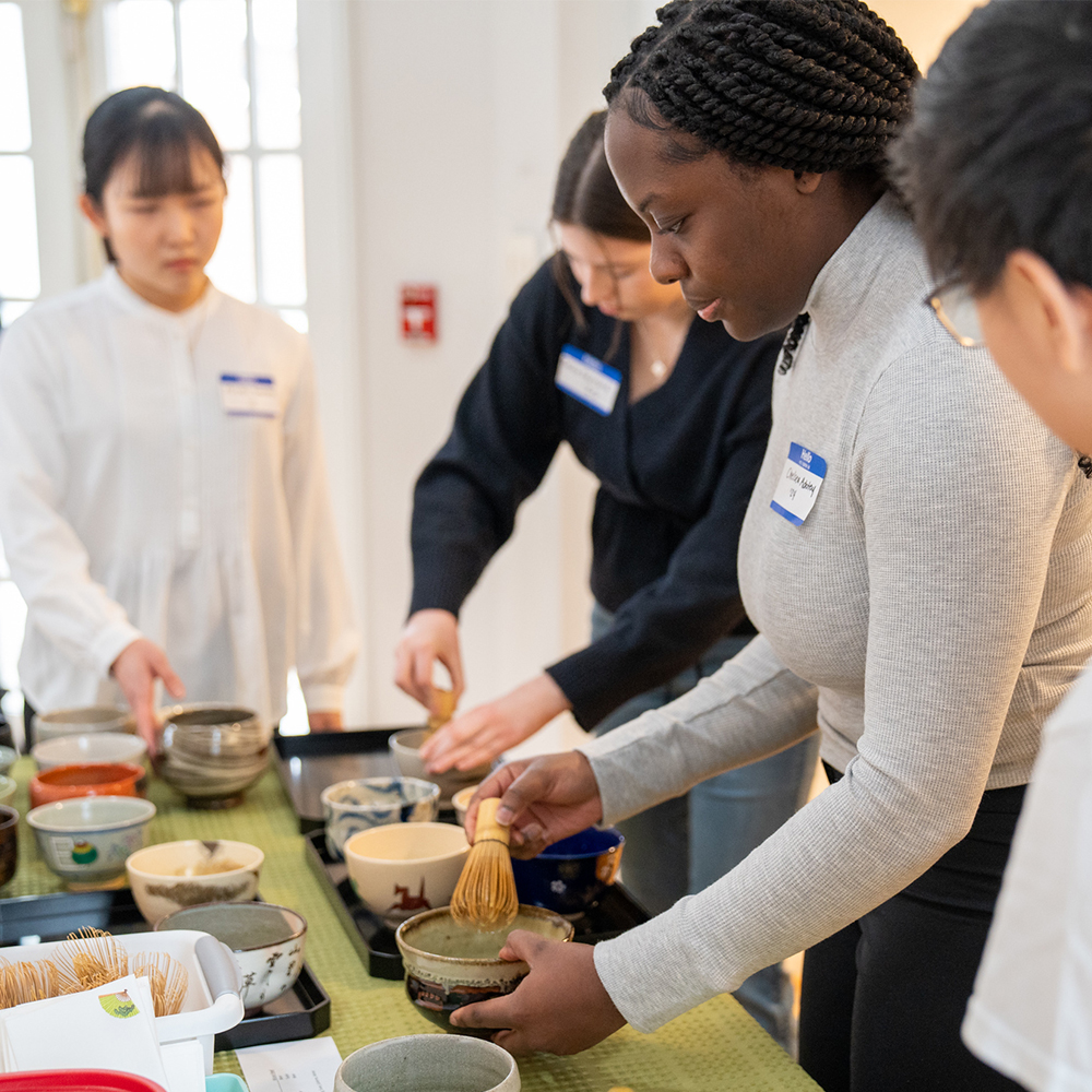 Students preparing tea during Martin Luther King Jr. Day Tea Ceremony