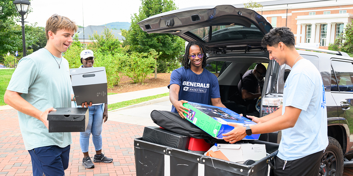 Students helping with move in