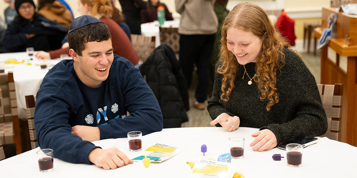 Students playing dreidel