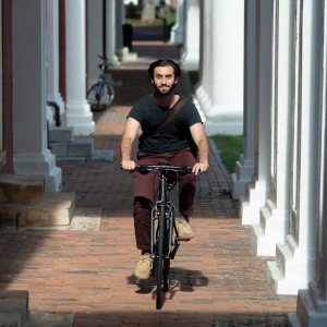 student riding a bike